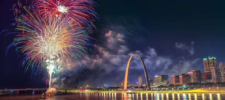 fireworks explode over the Gateway Arch in St. Louis