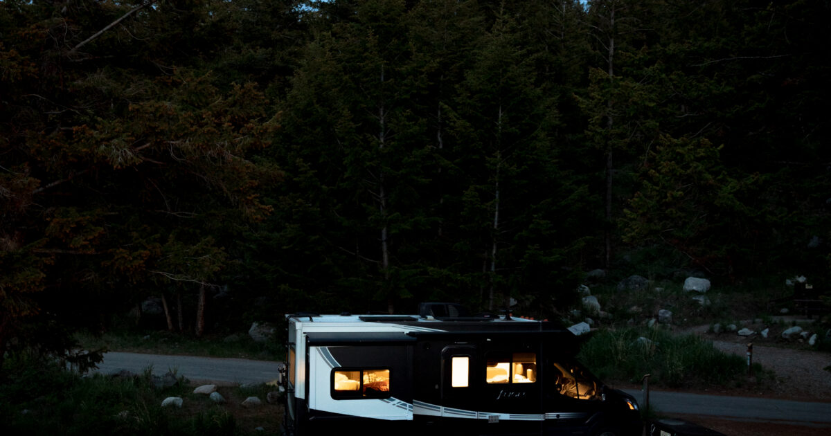 an RV with stylish bedding