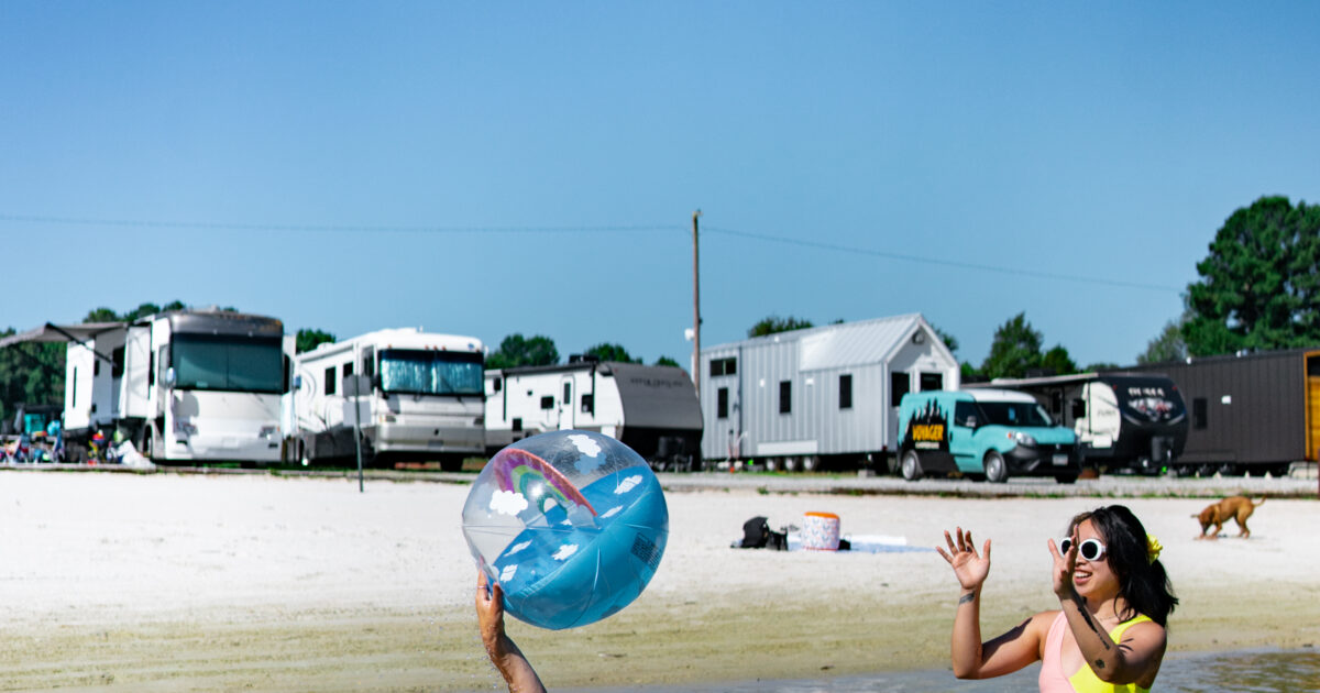 Lots of RVs parked at a campsite