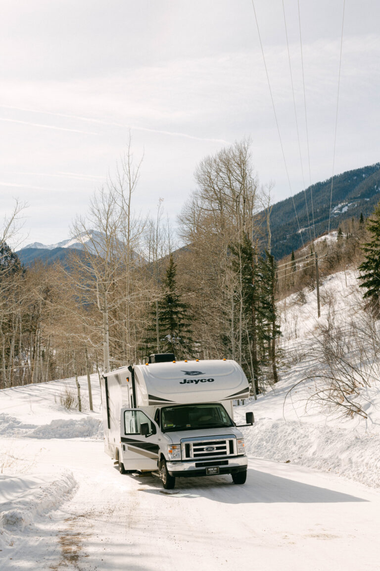 An RV parked in the snow