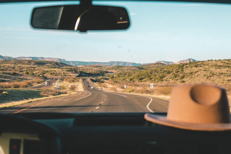 a camper driving down a road