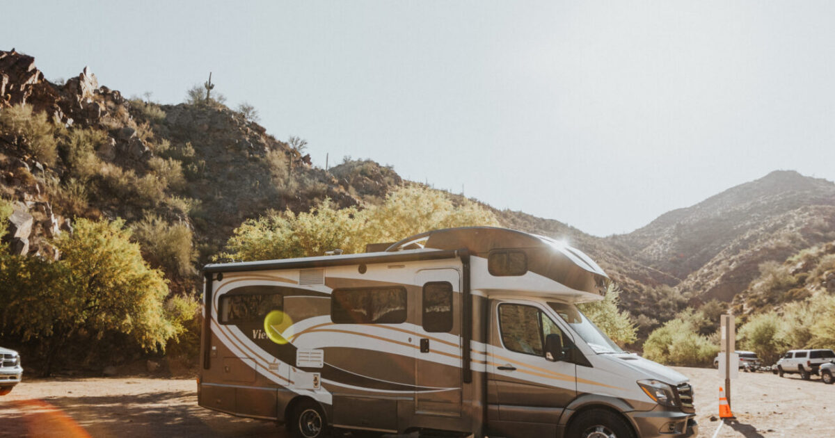an RV parked in the desert