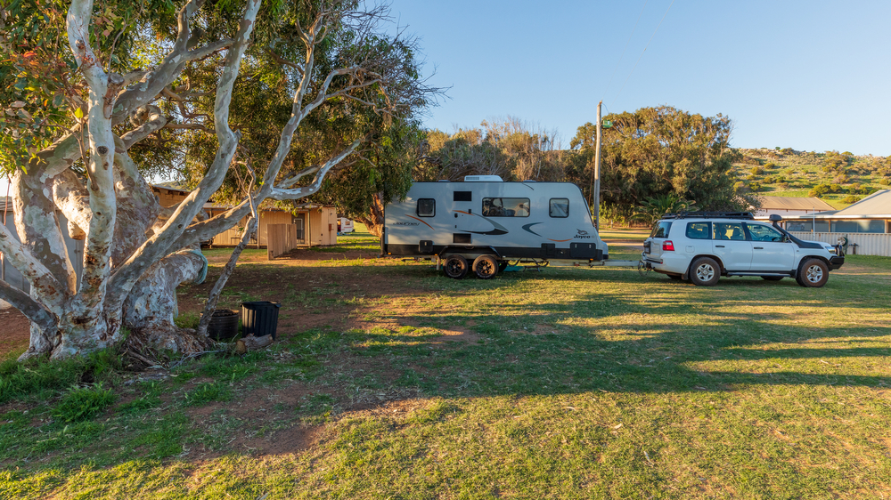 a trailer parked on a farm