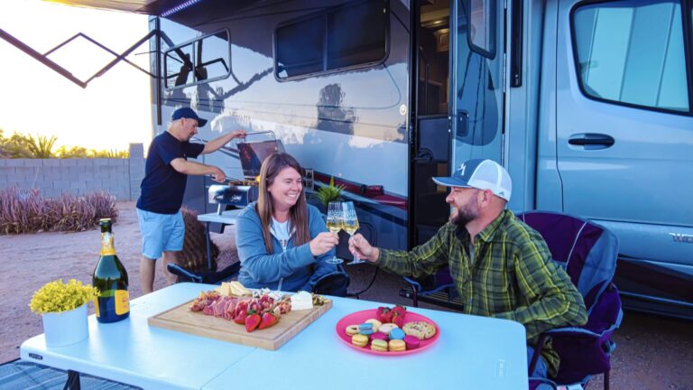 Friends hanging out under RV awning