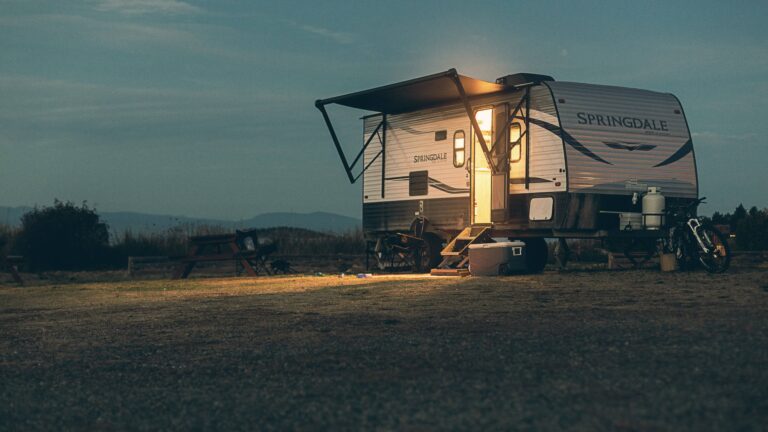 Travel trailer sitting in campsite