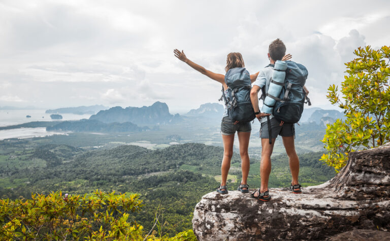 hikers looking at a scenic mountain view