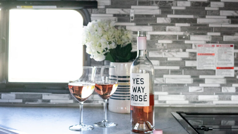 an RV kitchen with upgraded tile backsplash