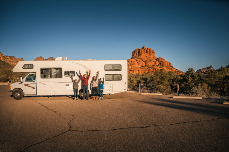 mom with kids in front of RV