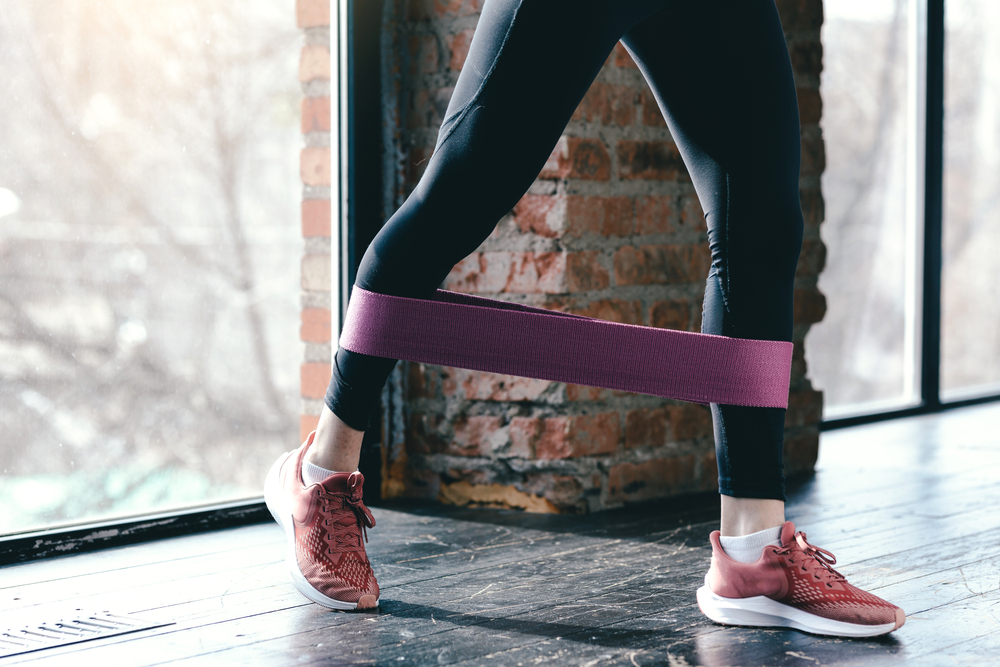 woman using resistance bands