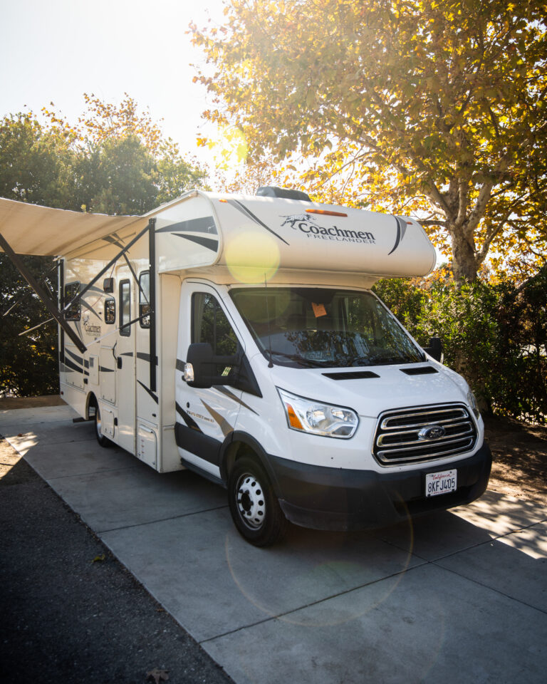 An RV set up on a camping pad