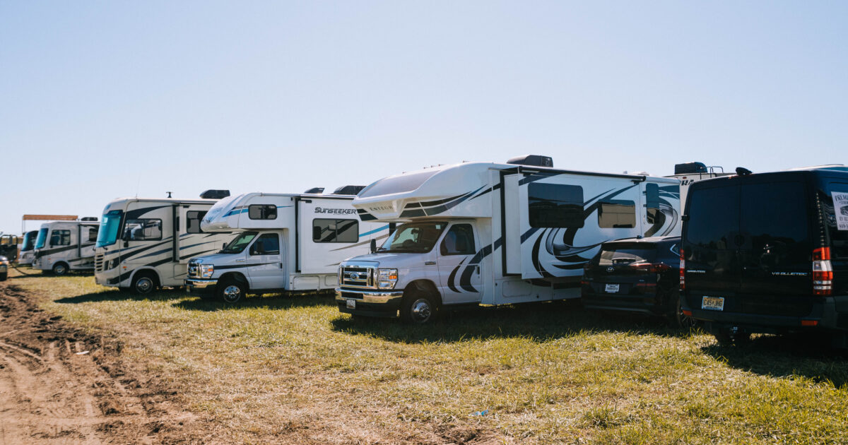 lots of RVs lined up in a lot