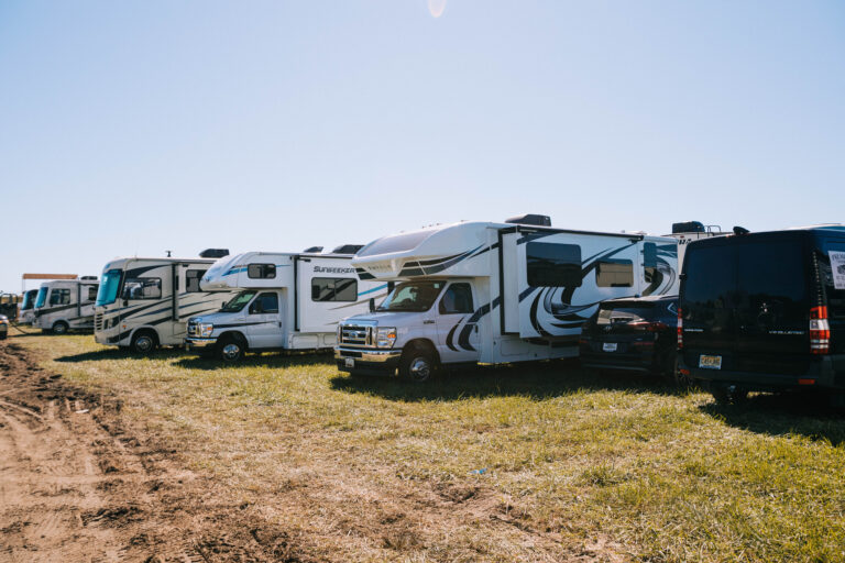 lots of RVs lined up in a lot