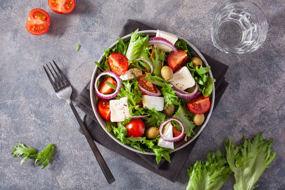 A salad and glass of water