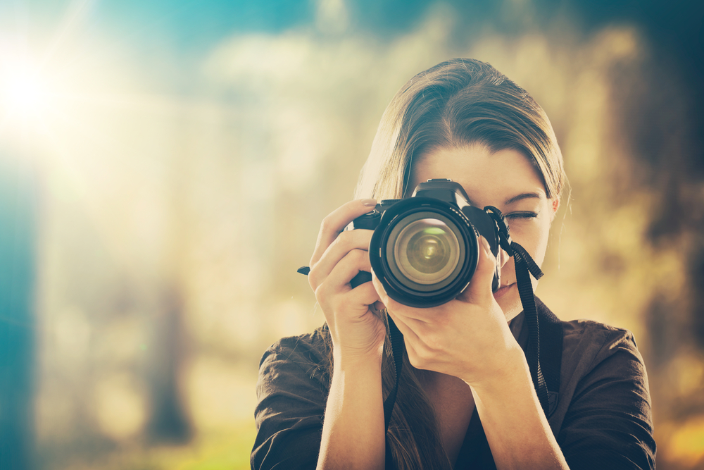 a woman taking a picture