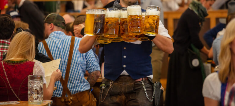 people drinking beer at Oktoberfest