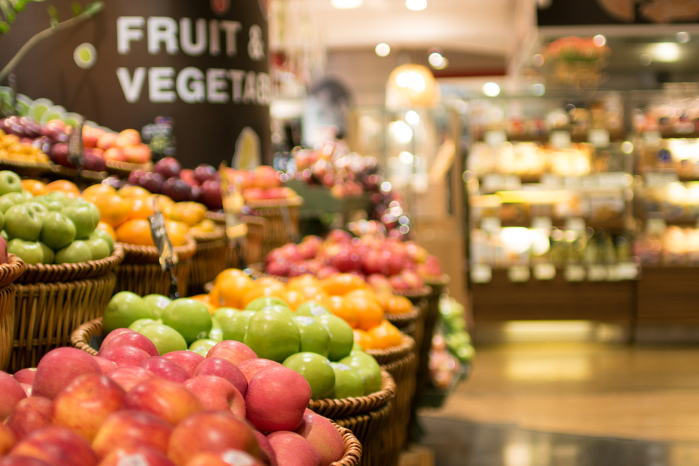 fruit in bins at a grocery store