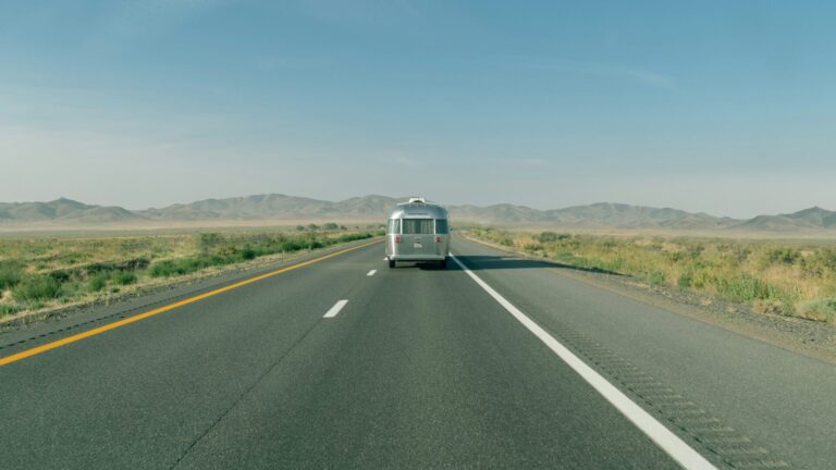 RV driving down the highway enjoying summer road trips