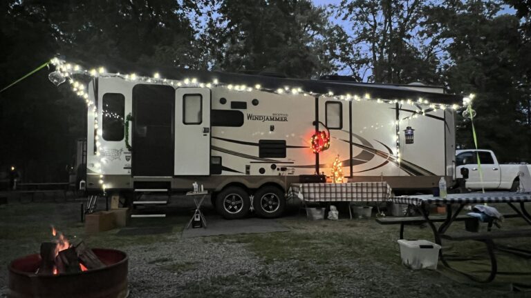 Travel trailer with some RV awning accessories