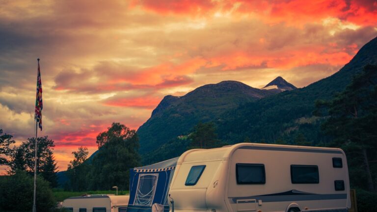 an RV awning screen room next to a trailer