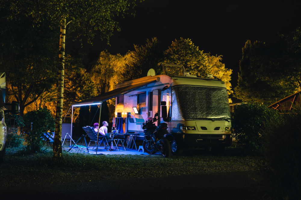 an RV awning lit up at night