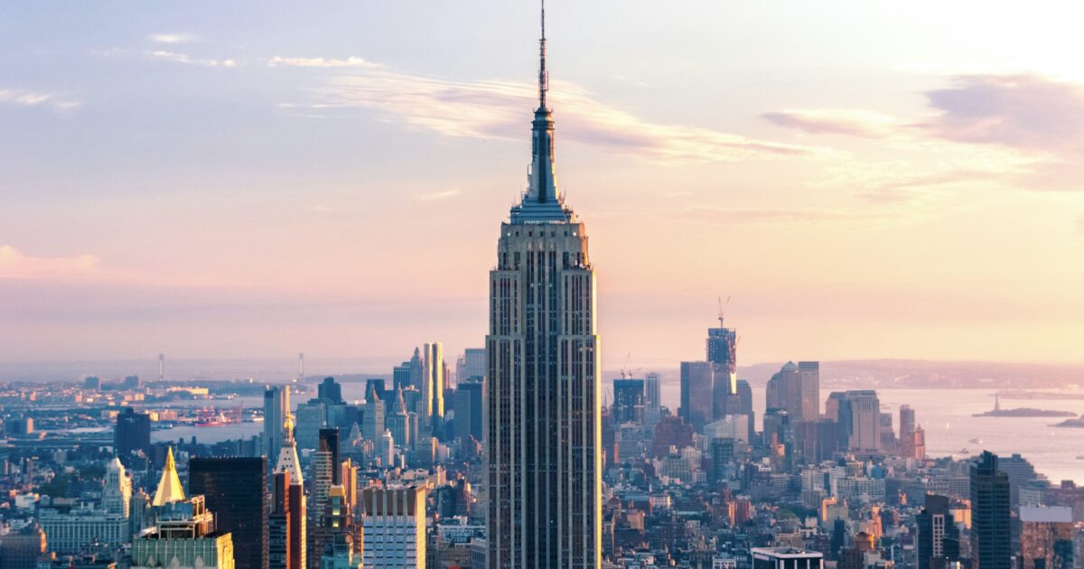 The Empire State Building against a sunset, one of the best New York landmarks