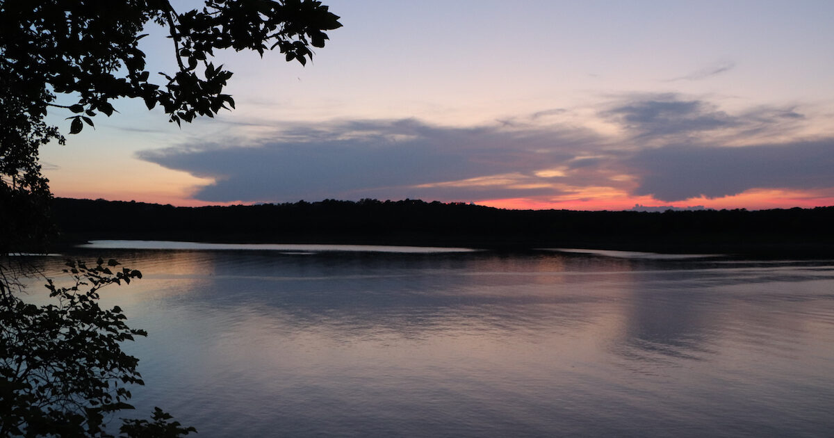 A sunset over Keystone Lake in Oklahoma. This is a great place for fishing in Oklahoma.