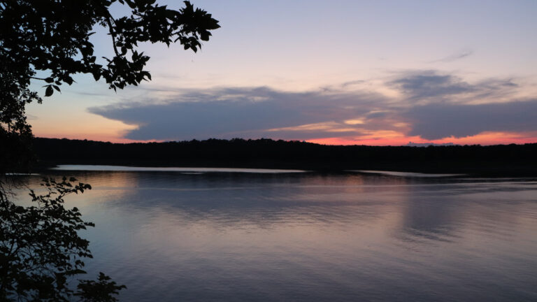 A sunset over Keystone Lake in Oklahoma. This is a great place for fishing in Oklahoma.