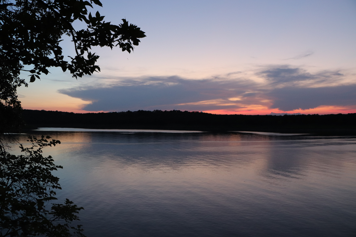 A sunset over Keystone Lake in Oklahoma. This is a great place for fishing in Oklahoma.