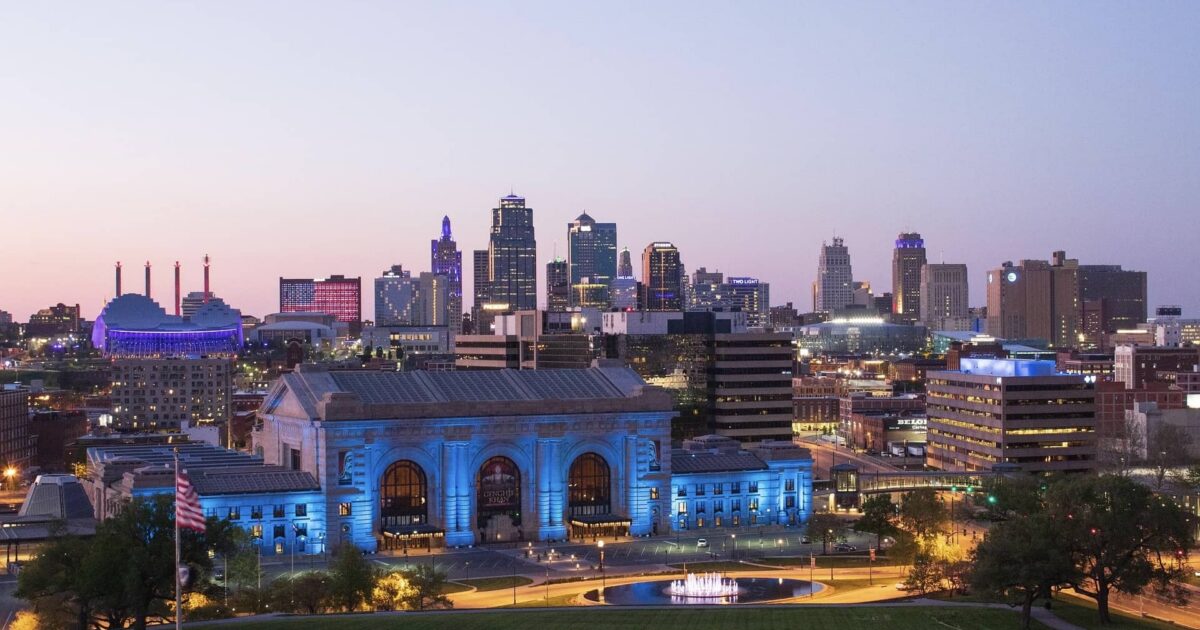 Kansas City skyline at night, one of the prettiest sights when urban camping in Kansas.