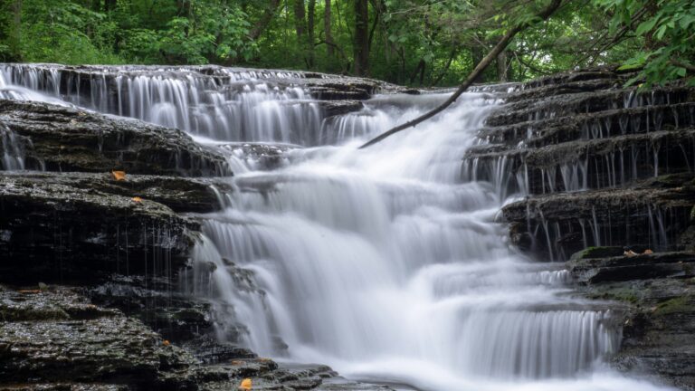 Beautiful waterfall in the woods, one of the best Kentucky waterfalls