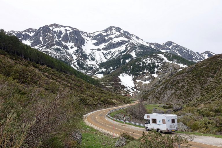 RV driving through mountains