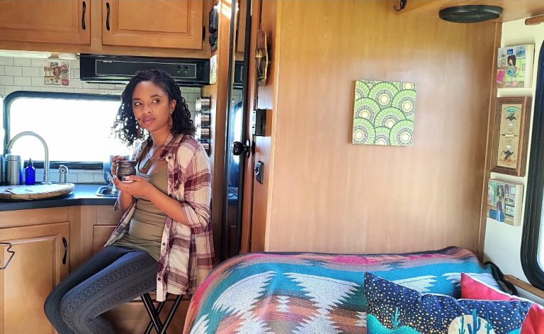 woman enjoying tea in an rv