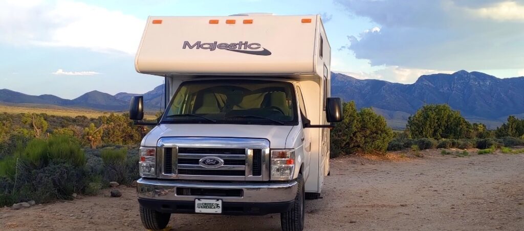 Class C RV parked in the desert