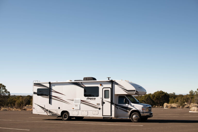 An RV parked in a parking lot