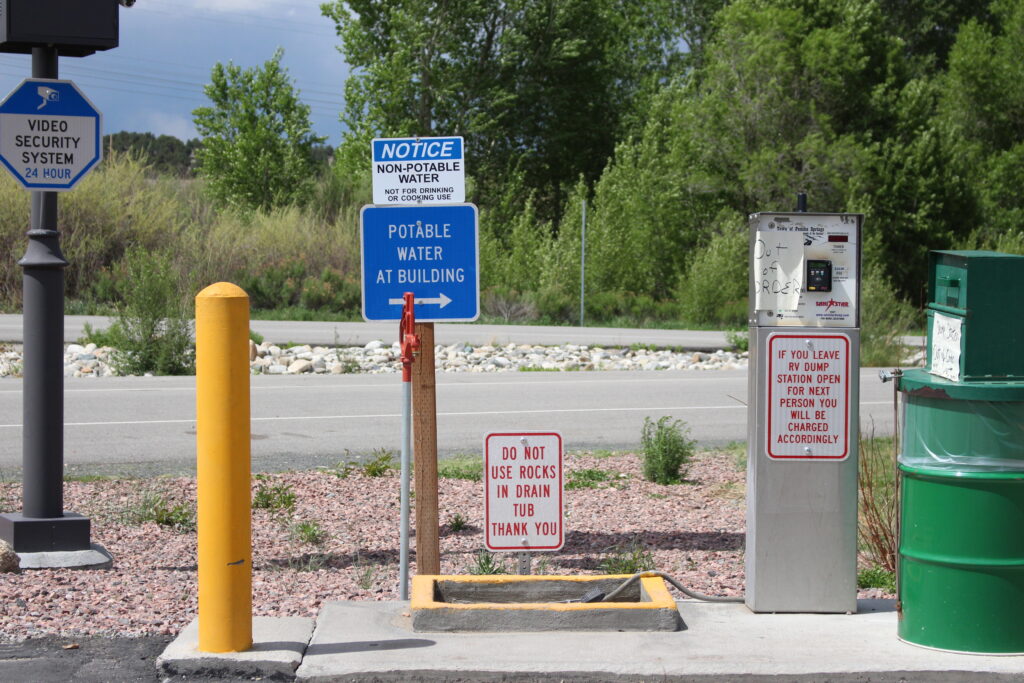 signs at the free RV water and dump station