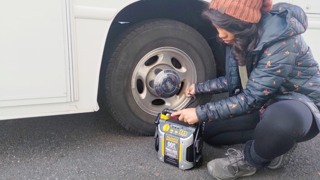 Woman fills tires