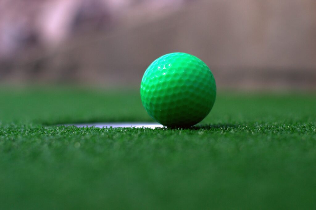 Mini golf green and ball