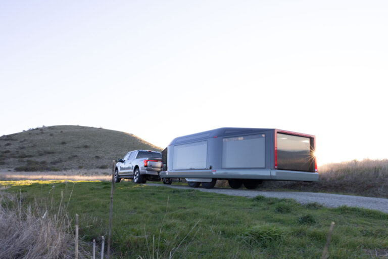 lightship electric trailer being pulled by a truck