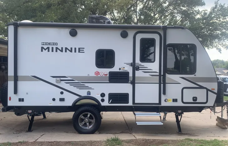 Micro Mini Winnebago trailer parked