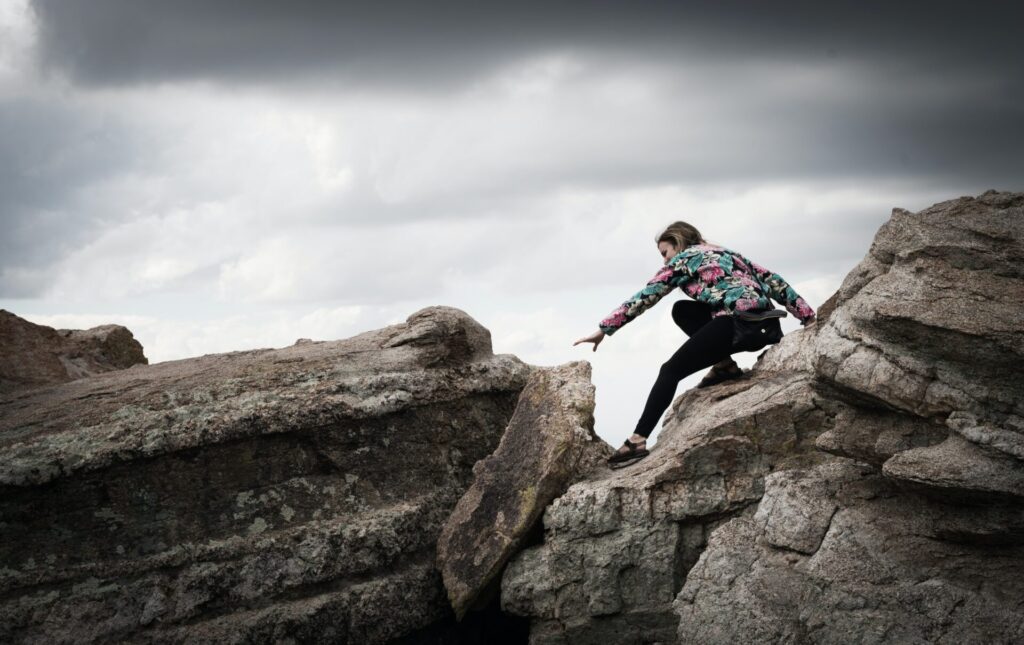 girl exploring rocks in Coronado National Forest