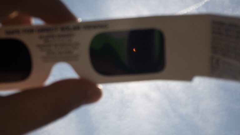 Solar eclipse through viewing glasses