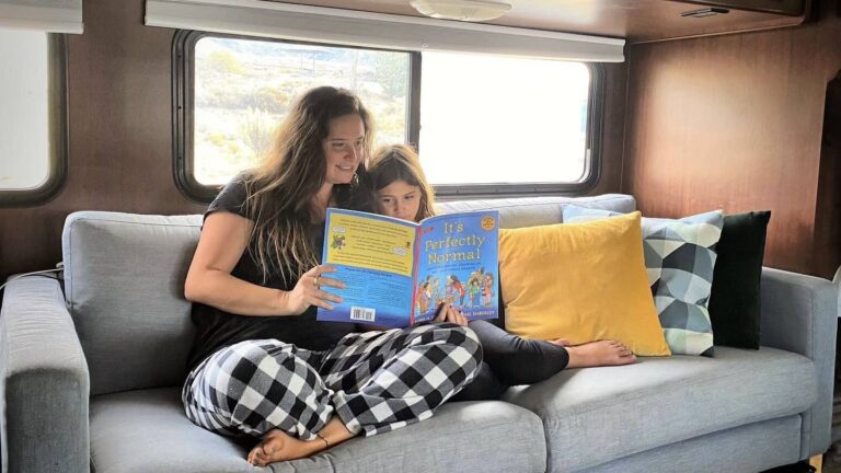 Mom and daughter sitting on RV couch - Zulalife