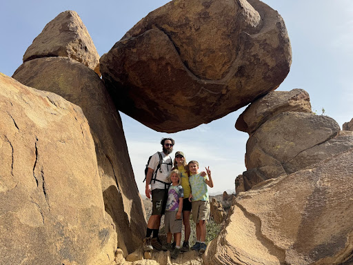 Family of four on a hike in Big Bend