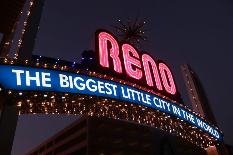 The neon Reno Arch declaring Reno 