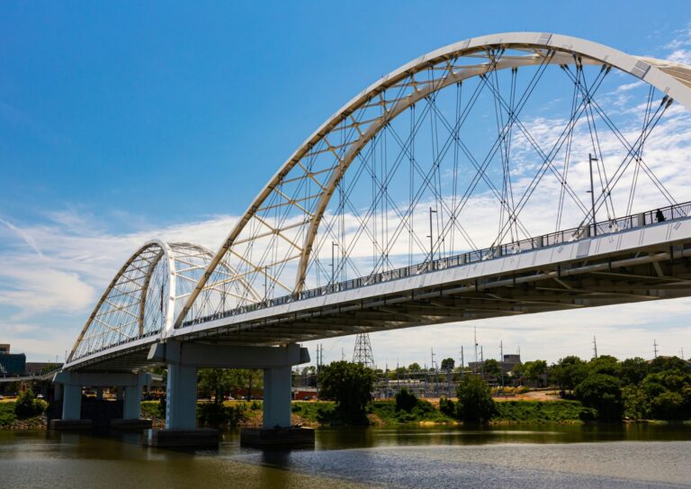 A bridge stretches over the Arkansas River to Little Rock, AR.