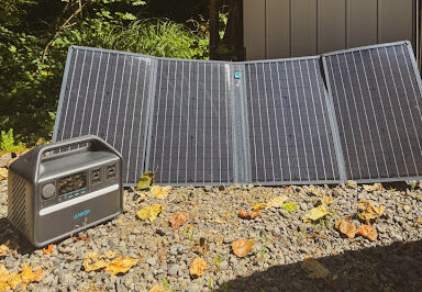 Anker 535 Solar Generator with portable solar panels charging outside