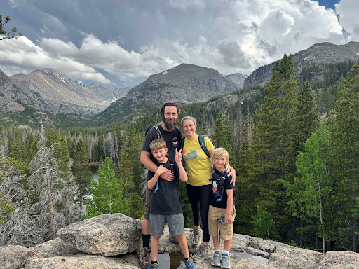 Family hiking in rocky mountain national park 