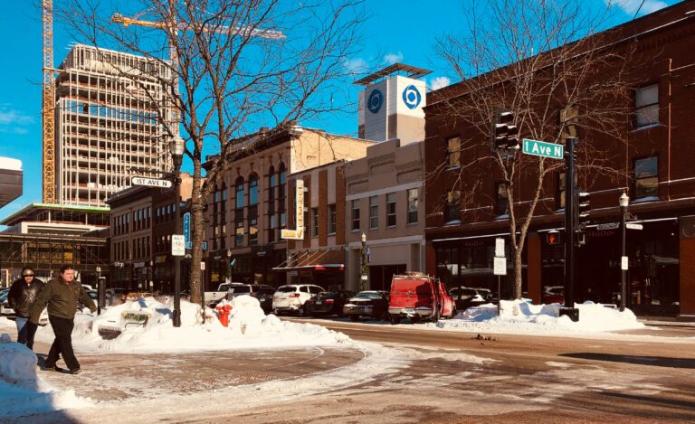 Daytime in downtown Fargo, with snow on the sidewalks