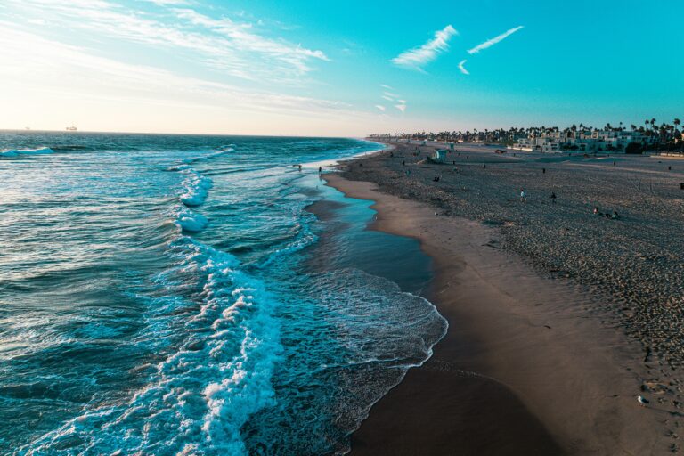 Ocean waves roll in on Huntington Beach, CA