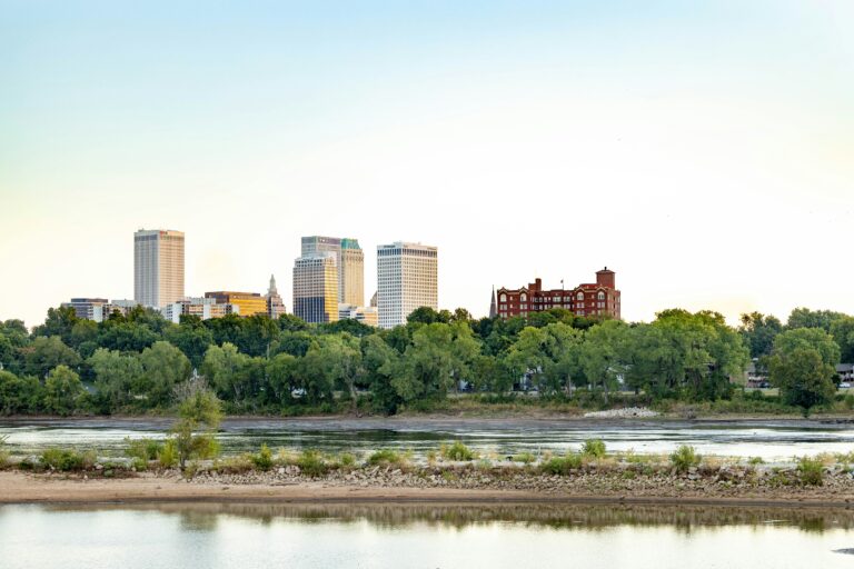 A body of water with downtown Tulsa, OK, in the background.